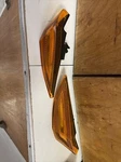 Porsche Side Marker Lights (991-631-257-82, 991-631-258.82). Fixed Price $125.00.