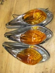 3 Vintage Yankee 76 Cab Clearance Marker Lights. Fixed Price $210.00.