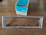 1970 Oldsmobile -98 Front Side Marker Lamp Bezel-part # 405365-230988. Fixed Price $10.00.