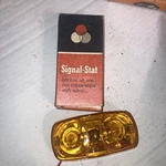 Signal-stat 1203A Die Cast Amber Clearance Lamp 2"X4" Incandescent Light. Fixed Price $15.00.