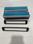 2 New Gm 14036311 1983-85 Celebrity Rh Rear Lh Front Side Marker Light Bezels. Fixed Price $24.01.
