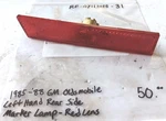 Original 1985-88 Gm Oldsmobile(?) Left Hand Rear Side Marker Lamp- Red Lens. Fixed Price $50.00.