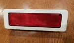 1980-1984 Oldsmobile Rear Side Marker Light Red Lens With Trim Ring Oem. Fixed Price $34.95.