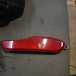 2014-18 Jeep Cherokee Driver Left Rear Bumper Reflector Red Oem 68105145A. Fixed Price $18.00.