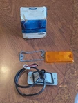 Nos Oem Ford D77Z-15A201-A Front Side Marker Light Courier. Fixed Price $89.00.