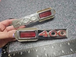 Pair 1969 Buick Lesabre 400 Quarter Panel Marker Light Bezel Emblems And Lenses. Fixed Price $75.00.