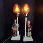 Columbia Statuary Leaning Hobo And Woman Lamp Pair Amber Glass Shades. Fixed Price $150.00.